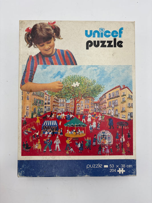 Unicef puzzle, Code 700F, "Festival in Orange"